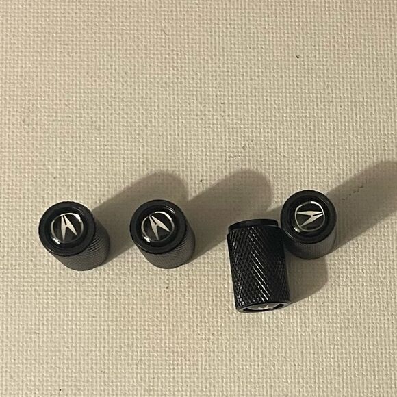 Acura Logo valve Stem caps in Black set of 4 NWT - Picture 1 of 4